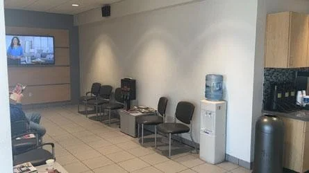 showroom interior with tv on img